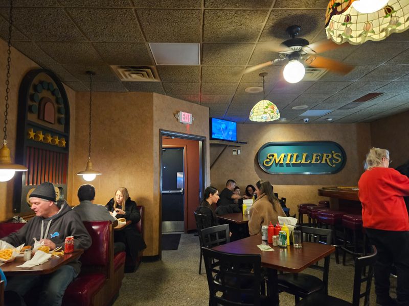 Inside the room: booths, buzz, and a neon glow