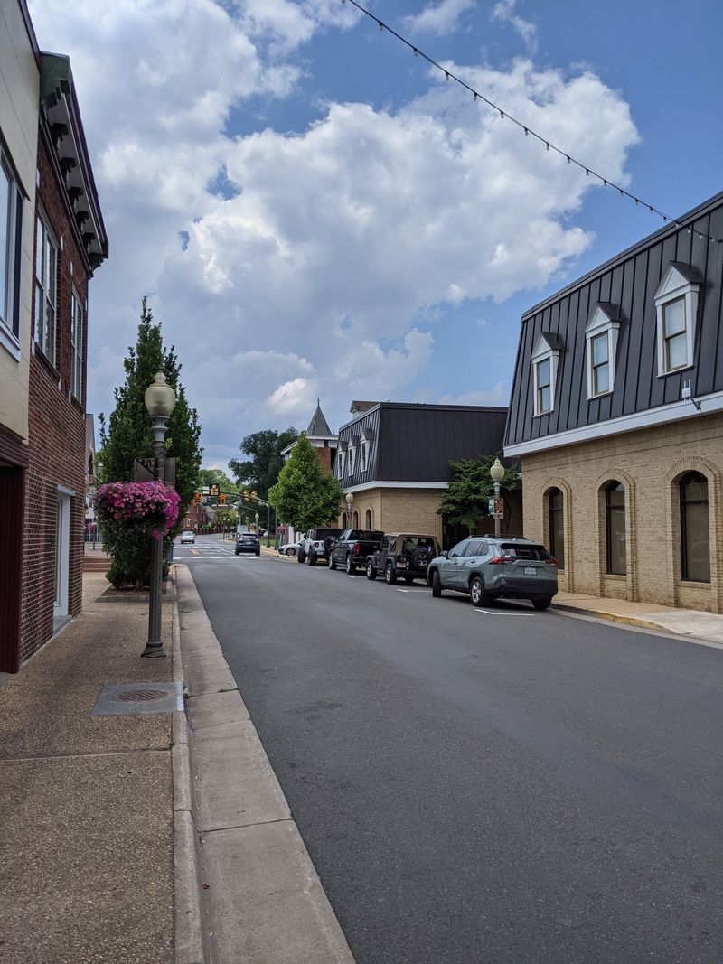 Main Street Morning: Coffee, Brick, And Blue Ridge Light