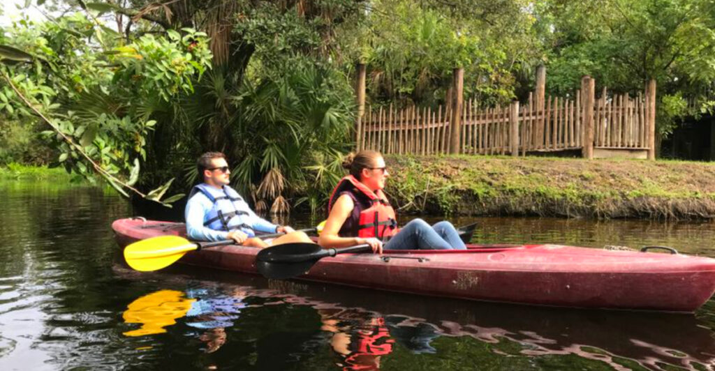 This 75-Acre Florida Zoo Lets Visitors Kayak Through Giraffe and Zebra Habitats
