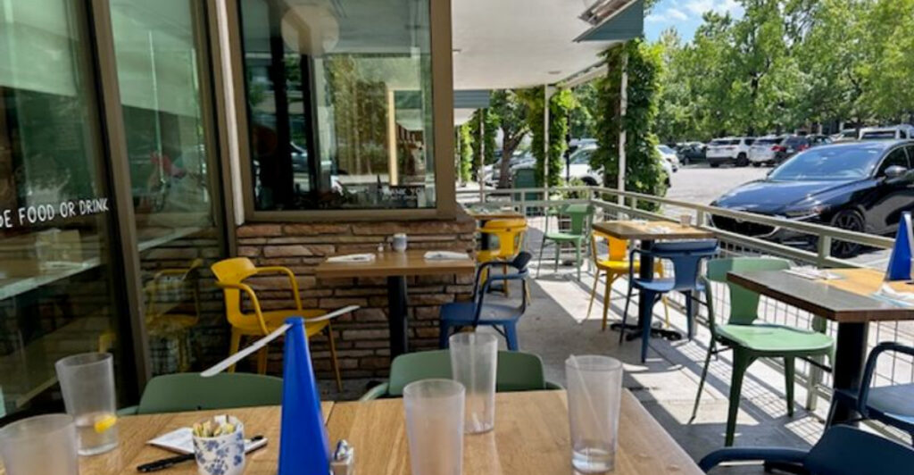 This Charming Oklahoma Spot Is Famous for Chicken Salad and Puppy Perks