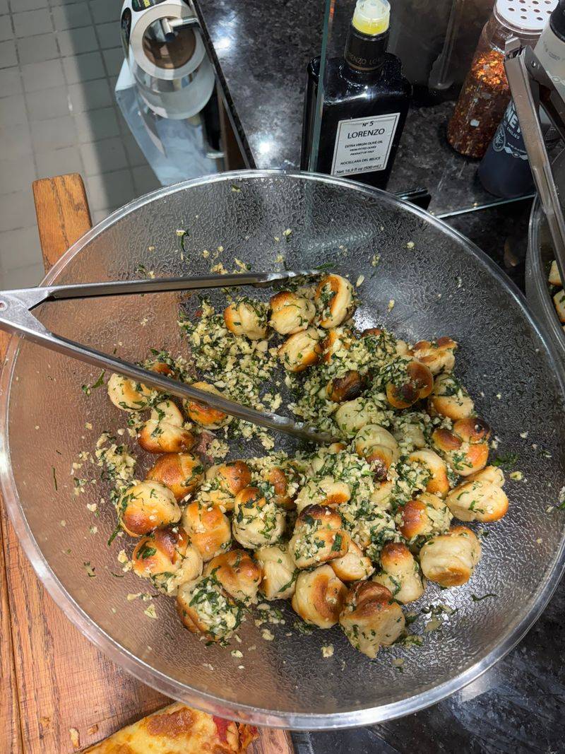 Garlic Knots and Parmesan Bites: Small Things, Big Pull