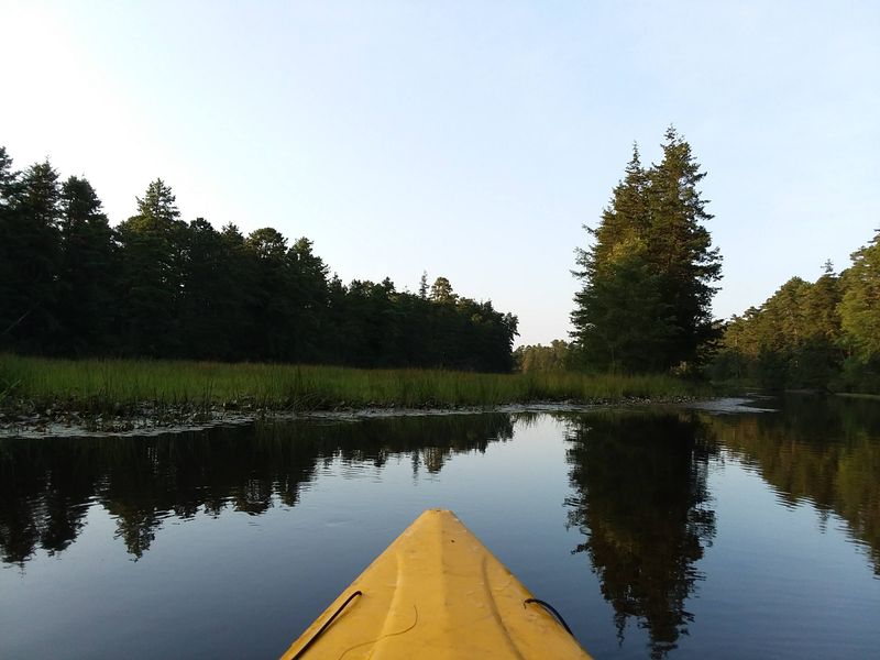Kayaks, Canoes, and Reflections