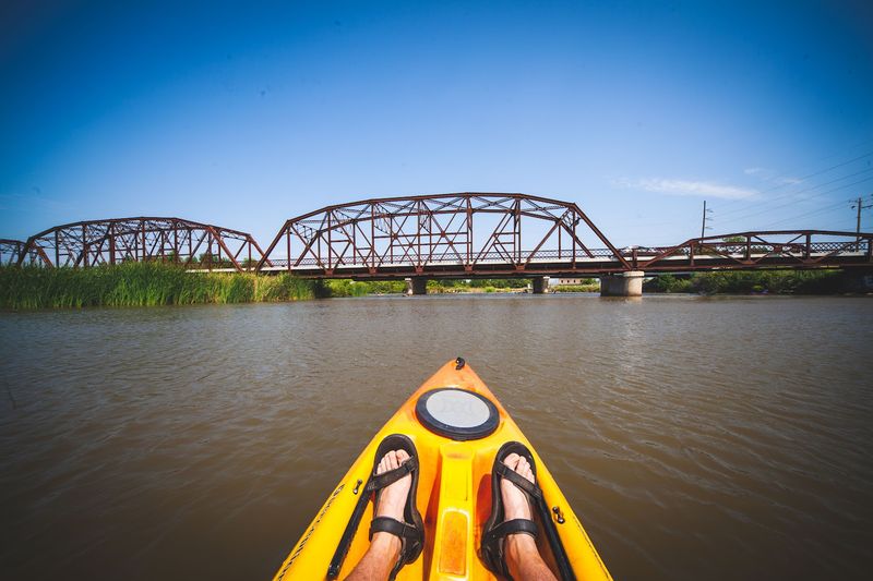 Kayaking and Paddling on the Water Below