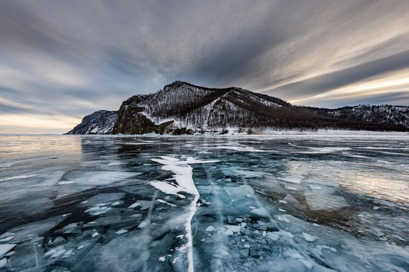 Lake Baikal's Crystal Ice with Frozen Gas Bubbles (Russia)
