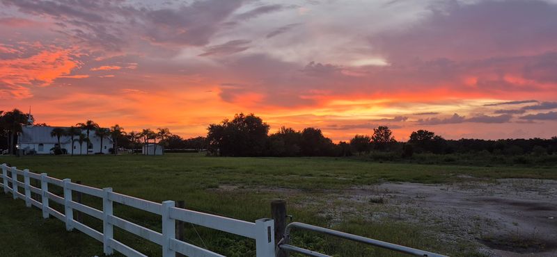 Horseback Riding Through Open Ranchland