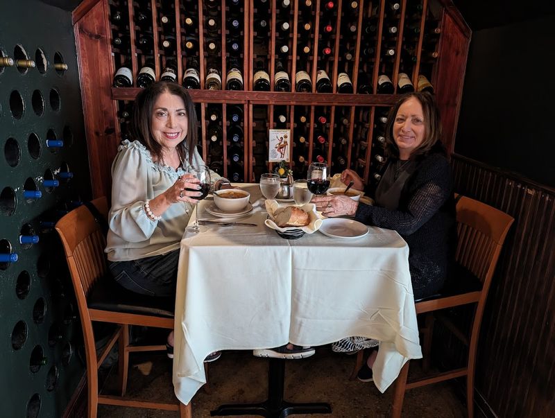 The Semi-Private Wine Cellar Seating Area