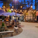 This Hidden Michigan Biergarten Feels Like Bavaria – Think Currywurst, Giant Steins, and Fairy Lights Under the Trees