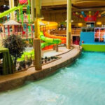 This Massive Oklahoma Indoor Waterpark Has 15 Wild Slides and a Wave Pool Under One Roof