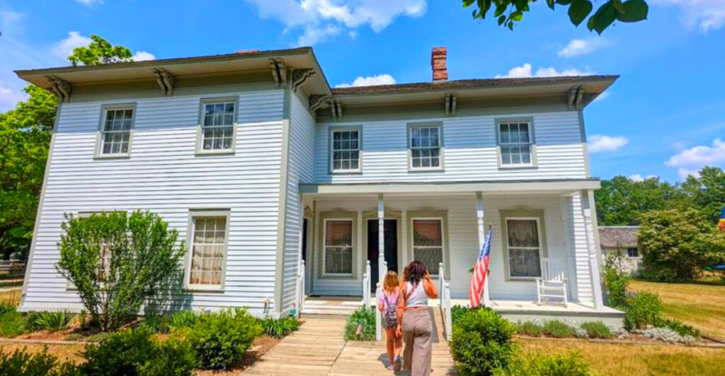 This Michigan Village Lets You Walk Inside 34 Real 1800s Buildings – Plus Ride a Steam Train Through History