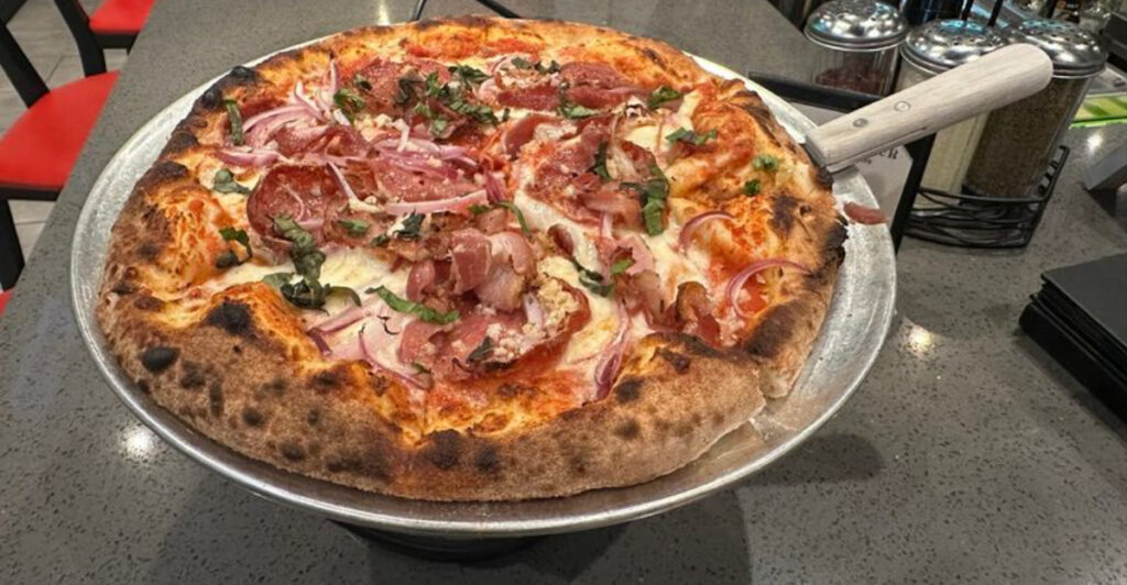 11 Iconic Orlando Pizzerias Locals Can’t Stop Talking About and Visitors Keep Coming Back For