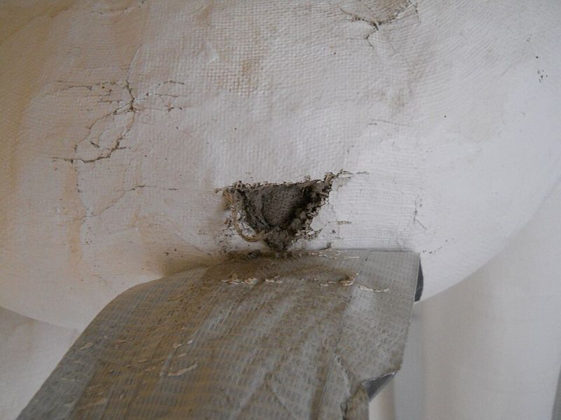 Asbestos Insulation Hidden in Walls and Attics