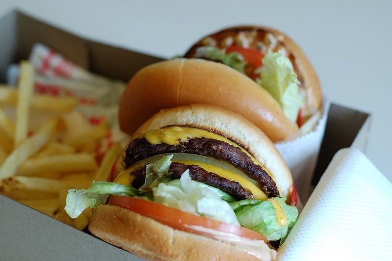 Double cheeseburger with lettuce and tomato