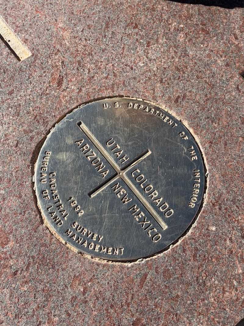 Four states meet at one exact point