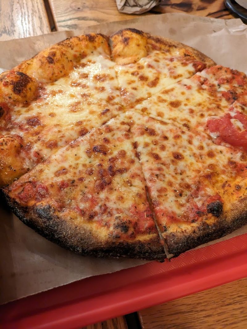 Wood-Fired Pizzas: A Surprising Addition to the BBQ Menu