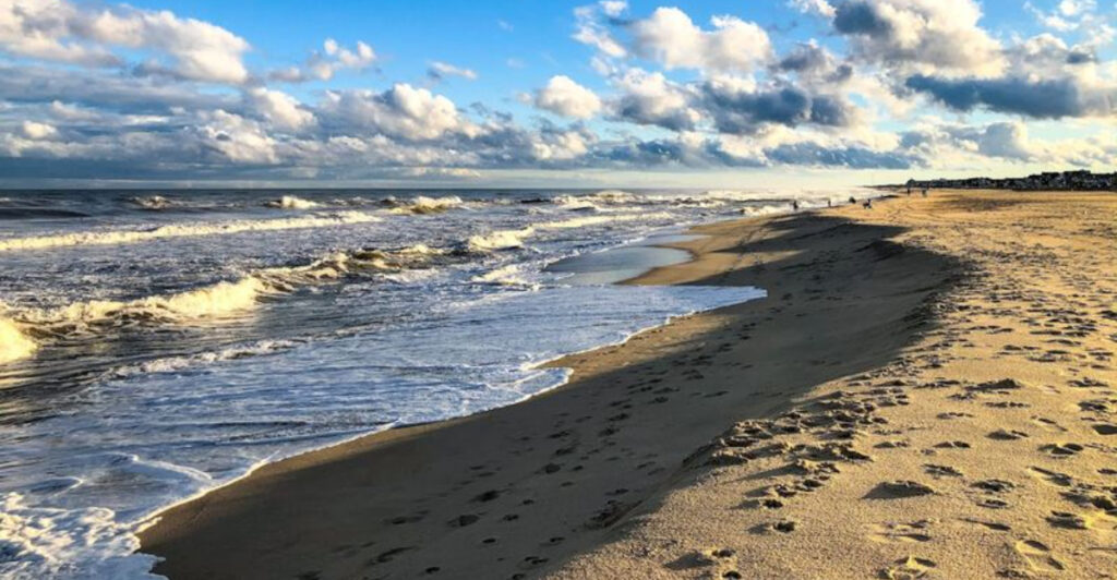 The Surprising Beach Town Where Surf Camp, Shipwreck Lore, and Vintage Boardwalk Stories Collide