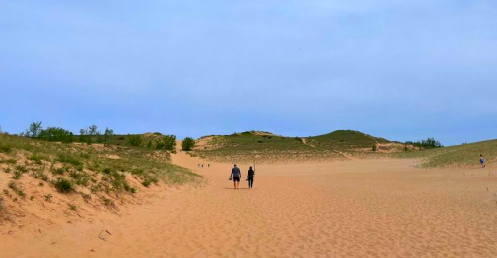 This 1,000-Foot Michigan Sand Dune Draws Thousands – And Climbing It Is Way Harder Than It Looks