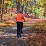 This 22-Mile Michigan Bike Trail Has Forest Canopies, Open Farmland, and an Ice Cream Stop Cyclists Love