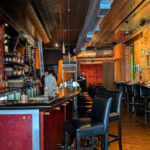 This Ann Arbor Spot Blends a 150-Bottle Wine List With Must-Try Dishes Like Short Ribs and Hot Honey Pizza