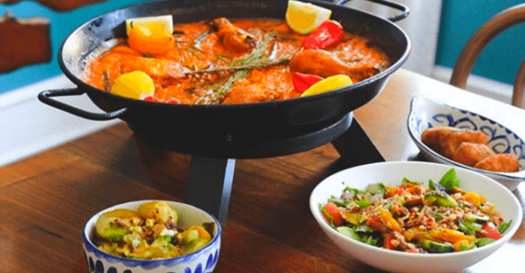 This Ann Arbor Tapas Spot Has 25+ Small Plates, Famous Paella, and a Buzzing Dining Room