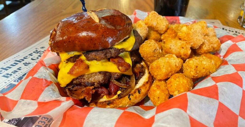This Big Rapids Bar Has Been Serving Flame-Broiled Burgers Since the 1800s – and Locals Still Pack It