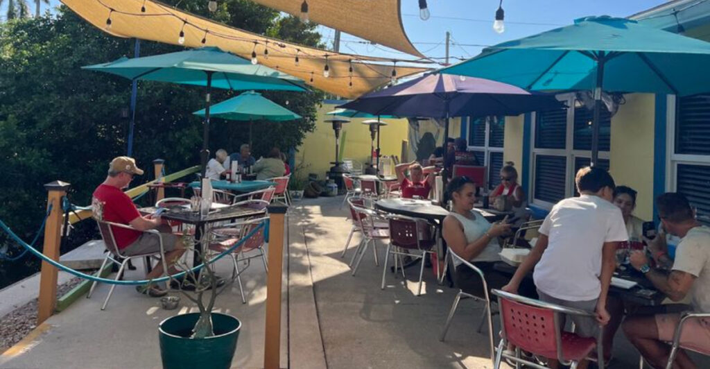 This Colorful Florida Waterfront Spot Is a Local Favorite for Fresh Seafood, Live Music, and Laid-Back Island Vibes