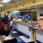 This Grand Rapids Diner Is Always Packed for Cinnamon Roll Pancakes and Banana Bread French Toast