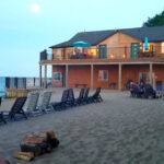 This Lake Huron Resort Has Beachfront Villas, Bonfires on the Sand, and Crystal-Clear Water