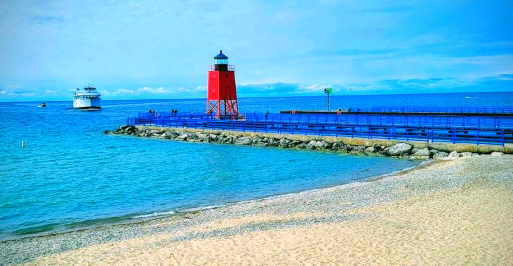 This Lake Michigan Beach Looks Caribbean-Blue – With a Red Lighthouse and a Charming Town Steps Away