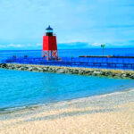 This Lake Michigan Beach Looks Caribbean-Blue – With a Red Lighthouse and a Charming Town Steps Away