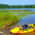 This Massive Michigan Park Has 8,000 Acres, Lakeside Trails, and a Water Obstacle Course Families Love