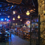 This Pensacola Hotspot Hides a Bourbon Street–Style Party Inside a Historic 1800s Warehouse