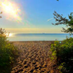 This Quiet Lake Huron Beach Has Wide Open Sand, Clear Water, and Hardly Any Crowds