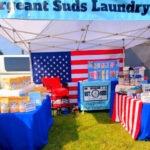 This Small Michigan Village Market Has 70+ Vendors, Fresh Bread, and a Train Rolling Through the Park