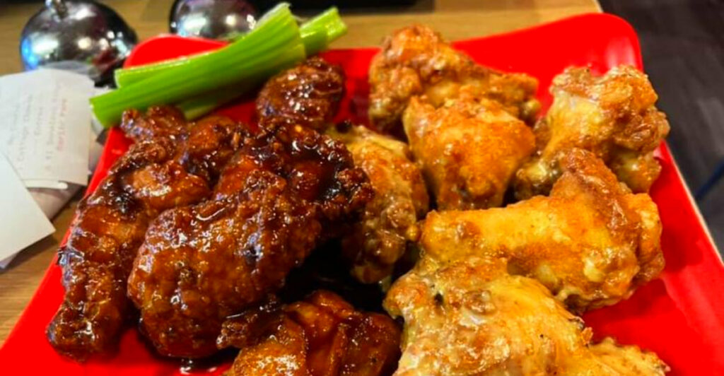 This Small-Town Michigan Bar Is Famous for Top-Rated Wings and Huge Portions