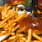 This Small-Town Michigan Tavern Is Famous for Olive Burgers, Fried Bluegill, and Crispy Tater Kegs
