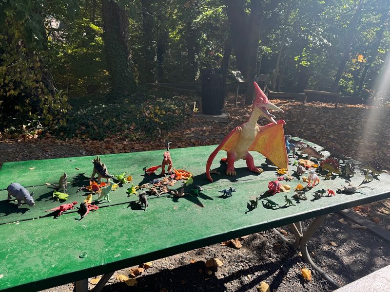 The Picnic Table and the Toy Dinosaurs