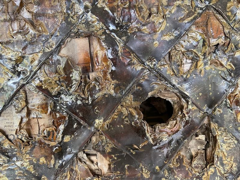 How the Walls Were Built: Newspaper as a Construction Material