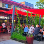 Housed Inside a Historic Railroad Freight House, This Montana Restaurant Serves Bison Potstickers, Elk Burgers, and One of Bozeman’s Best Nights Out