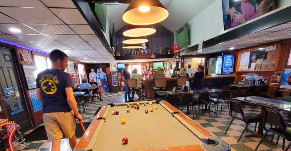 Locals Love This Manistee Bar Where You Can “Drink Behind Bars” and Order Fan-Favorite Wings