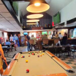 Locals Love This Manistee Bar Where You Can “Drink Behind Bars” and Order Fan-Favorite Wings