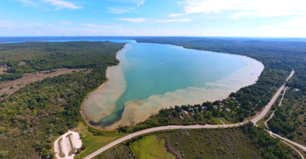 Near Sleeping Bear Dunes, This Crystal-Clear Michigan Lake Feels Like a Hidden Escape