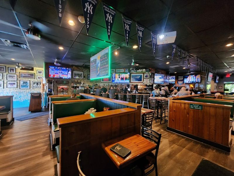 The Atmosphere Inside: Casual, Cozy, and Full of TVs