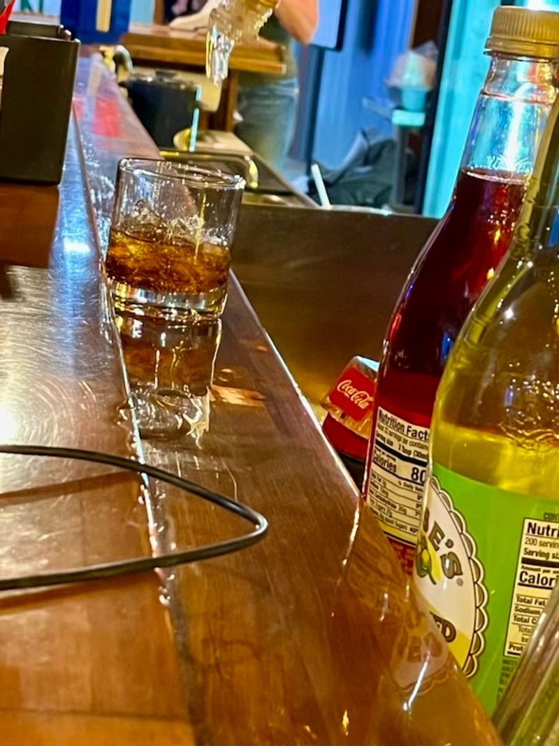 The Bar With a Story Carved Right Into It