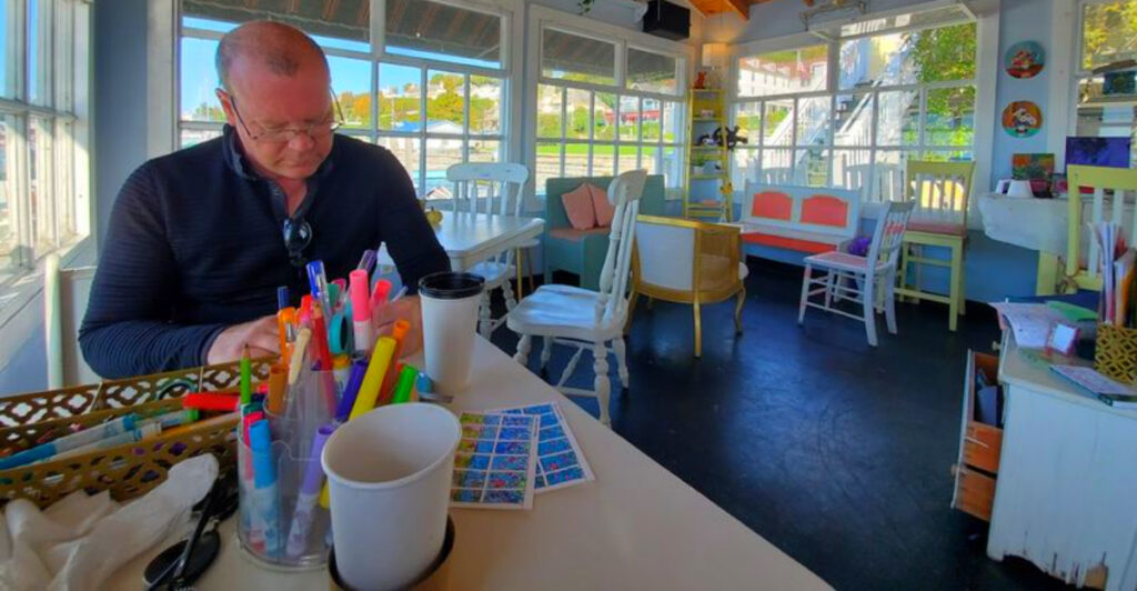 The Cozy Michigan Café Where Visitors Sip Lilac Lattes and Paint Watercolors by the Harbor