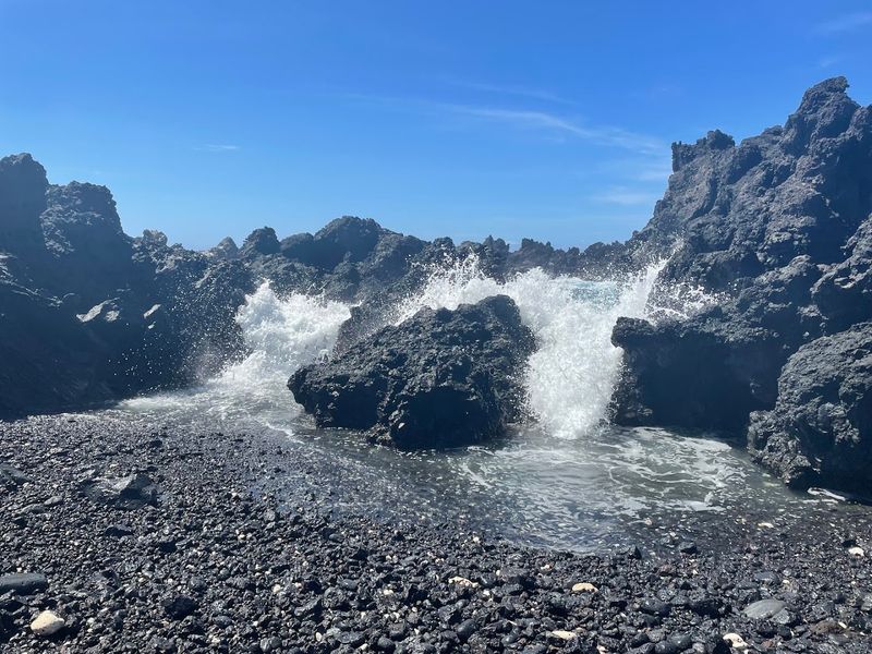 The Dramatic Landscape That Frames the Shore