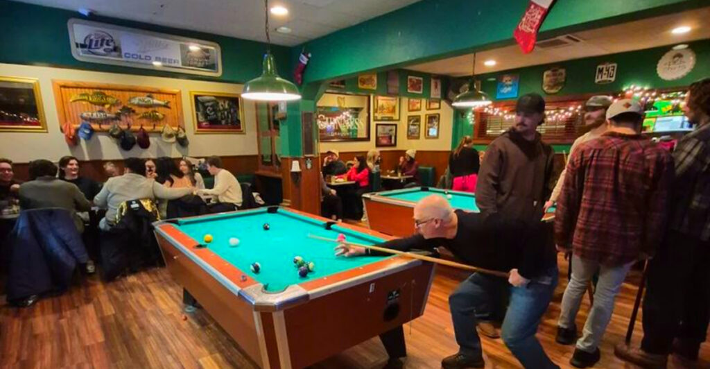 This Classic Traverse City Bar Has Legendary Wings, Pool Tables, and a Cozy Up-North Vibe Locals Love