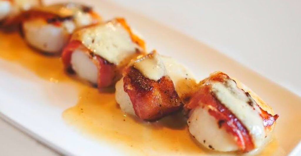 This Elegant Missouri Restaurant Has Bacon-Wrapped Scallops, Candlelit Tables, and a Reputation Worth the Drive