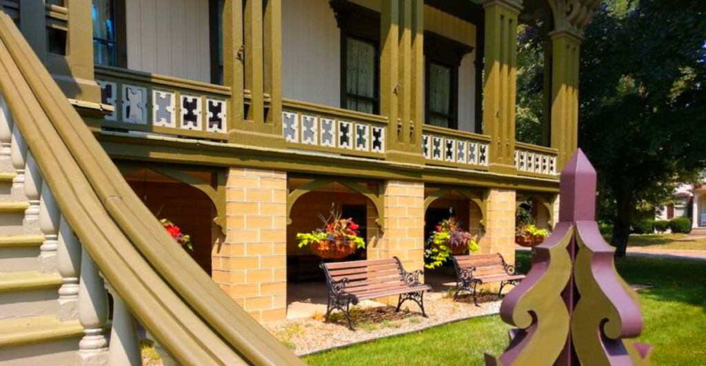 This Hawaiian-Inspired Michigan Mansion Has Tropical Murals, a Wraparound Veranda, and a Story You Won’t Believe