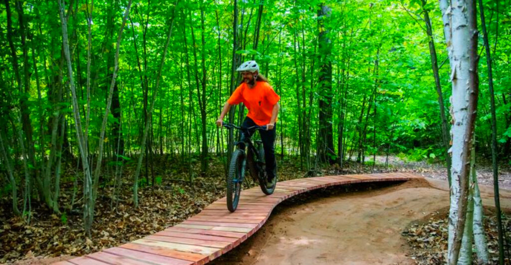 This Hidden Northern Michigan Trail System Has Flowing Forest Paths, Lake Views, and Smooth Rides Riders Can’t Stop Talking About