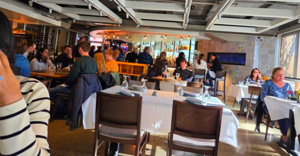 This Italian Trattoria Hidden Inside a Michigan Market Feels Like Dining in Italy
